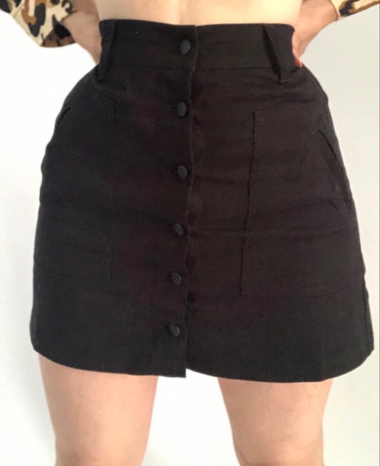 Black button mini skirt